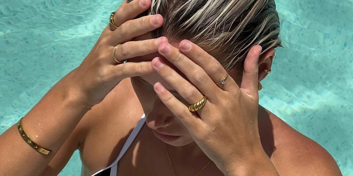 Woman swimming while wearing a stainless steel ring